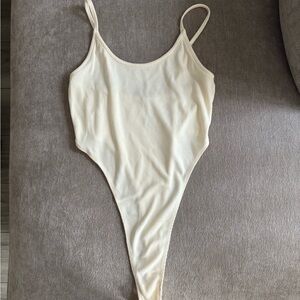 Cream Ribbed Bodysuit -sits high on hips